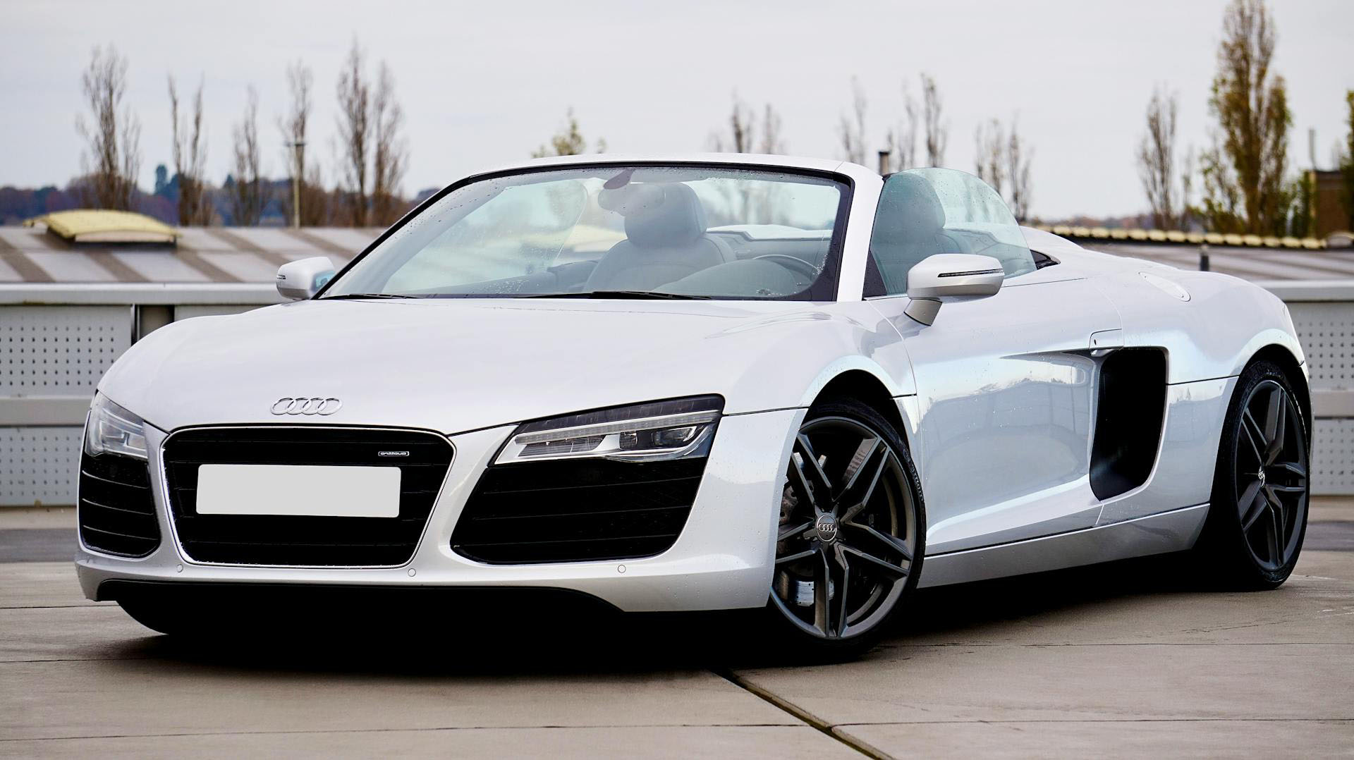 sleek white audi r8 convertible