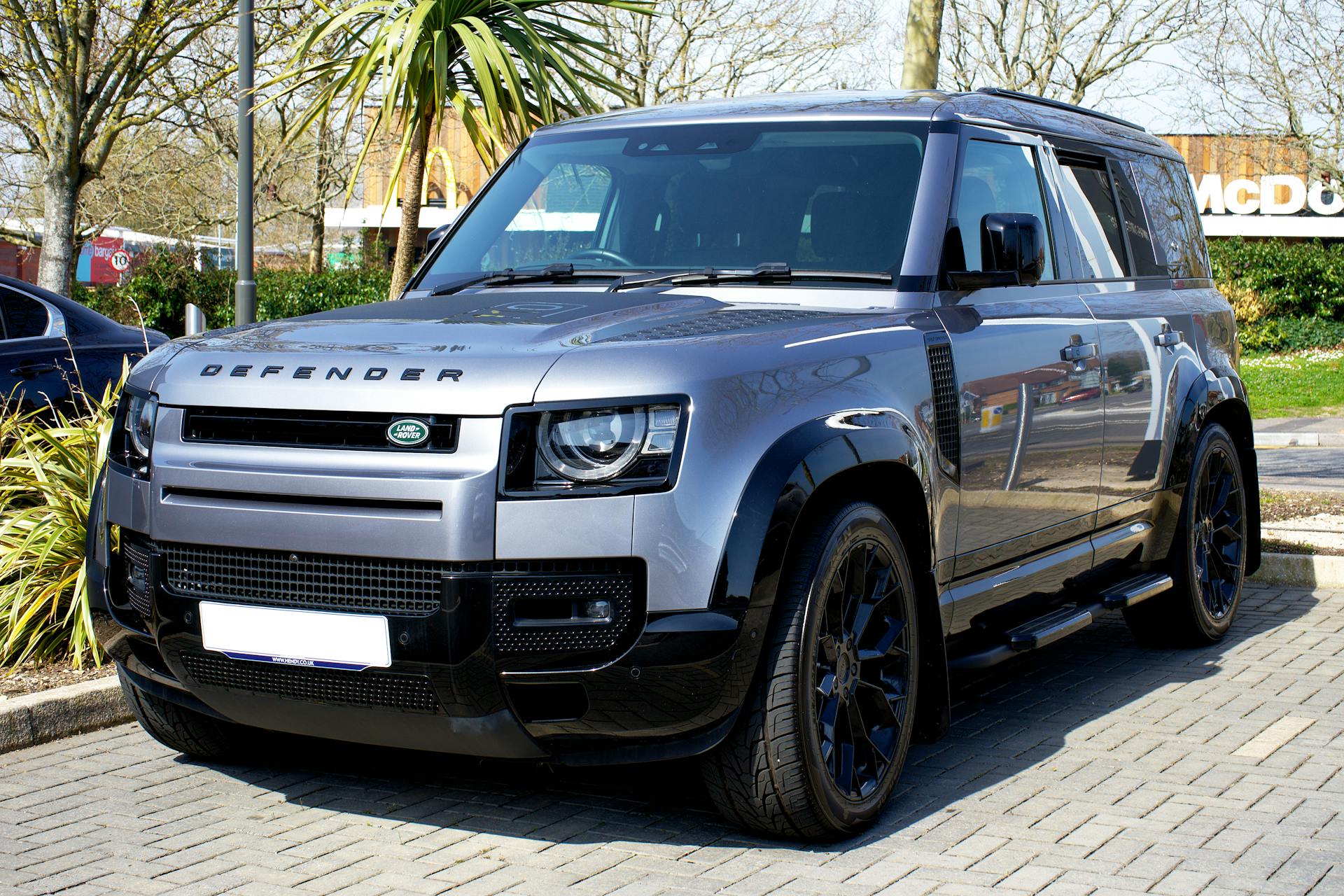 gray land rover defender suv