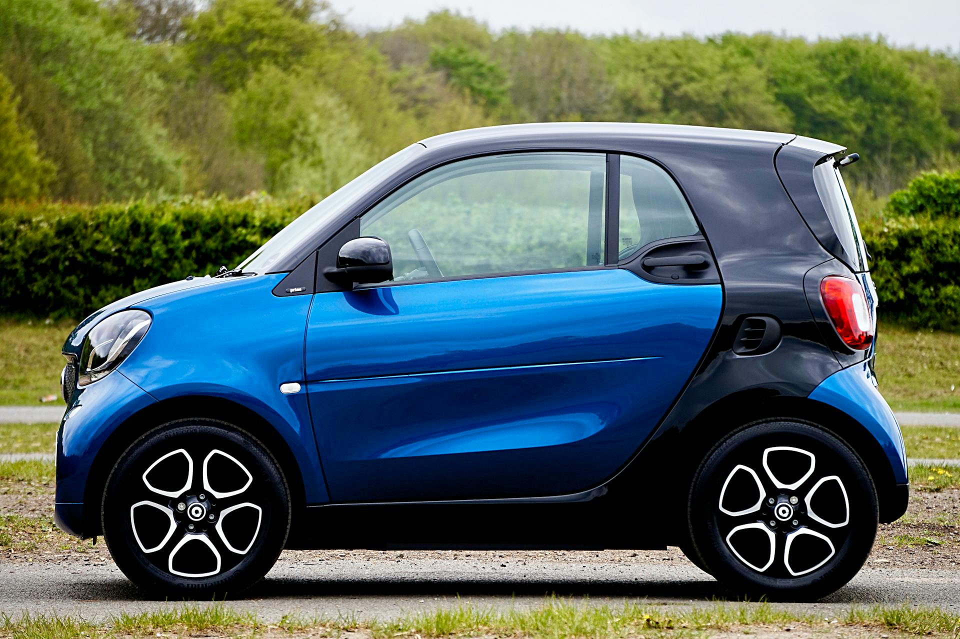 blue smart car side profile