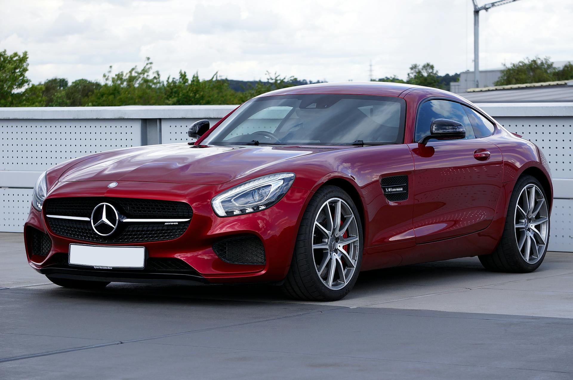 red mercedes-amg sports coupe