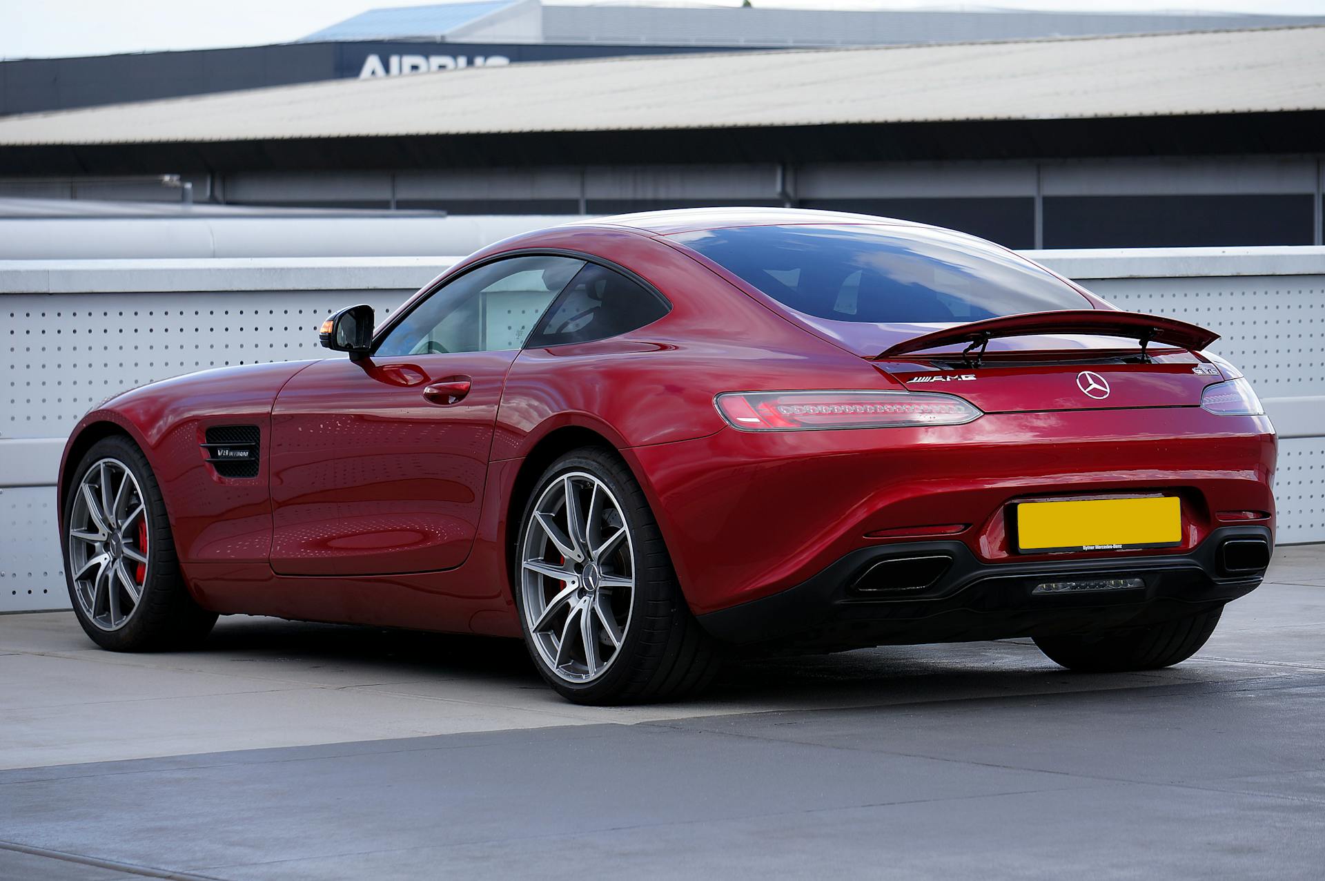 red mercedes-amg coupe rear view