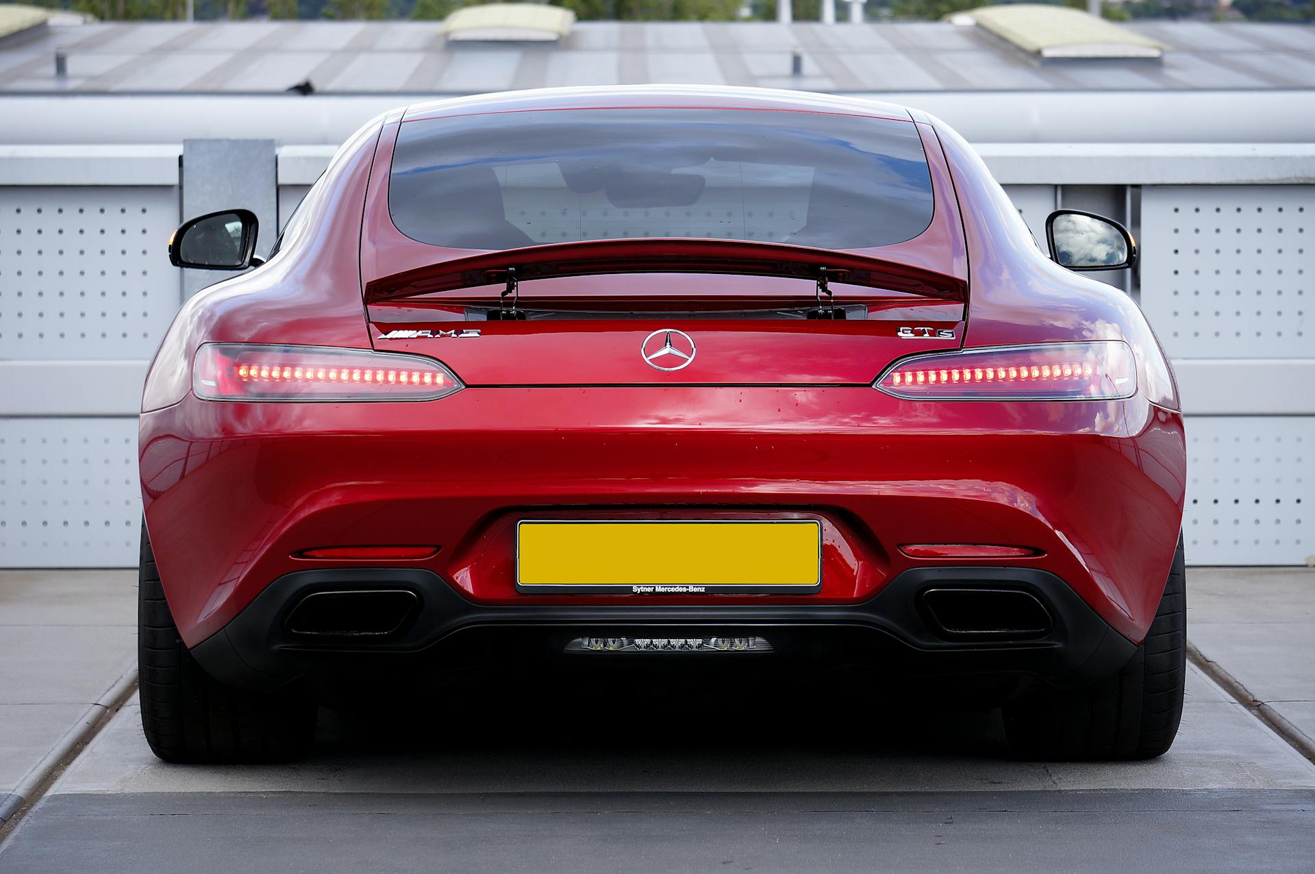 red mercedes-amg gt s rear view