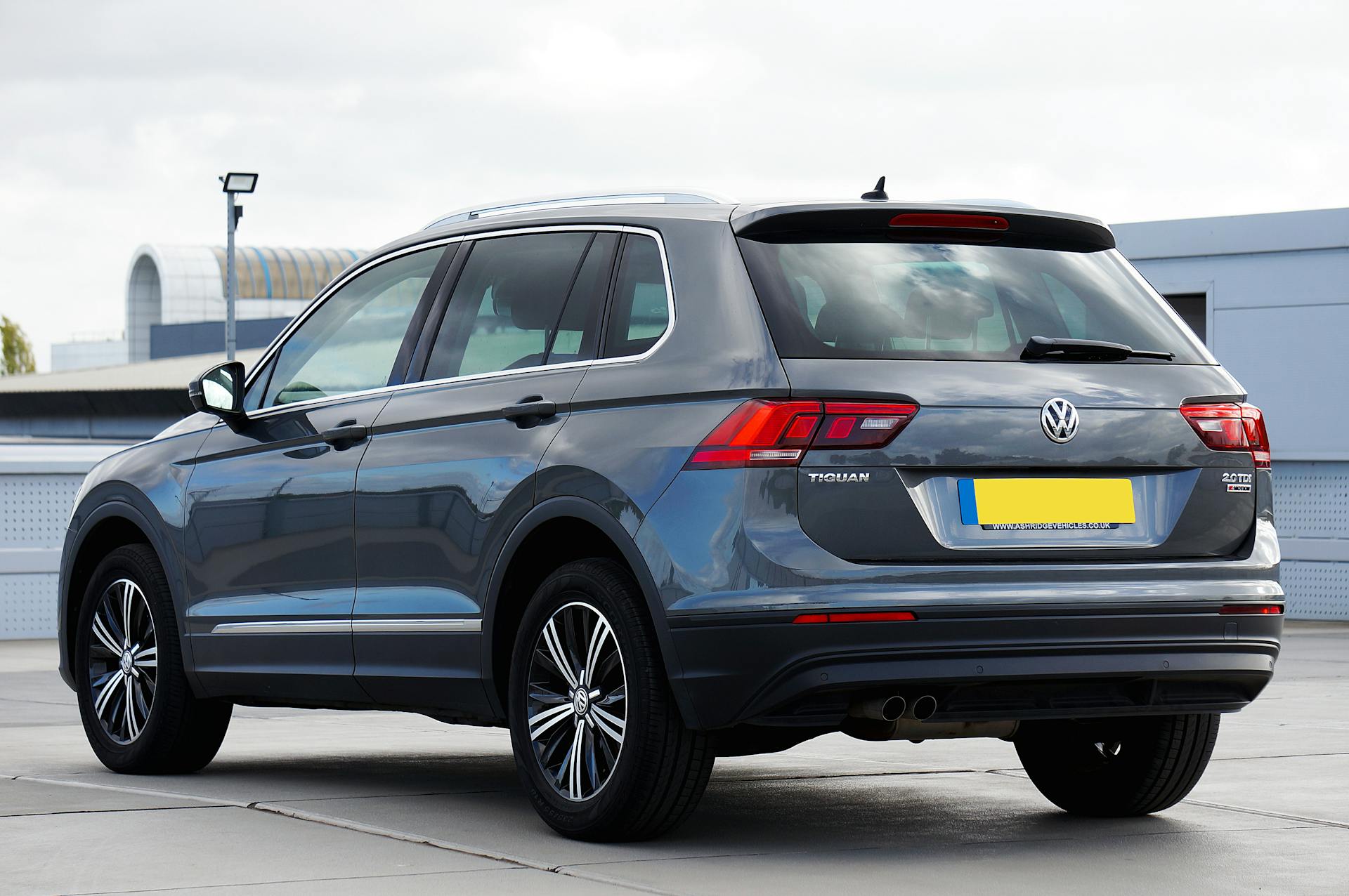 rear view of gray volkswagen tiguan suv