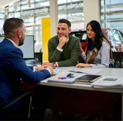 couple discussing car purchase deal